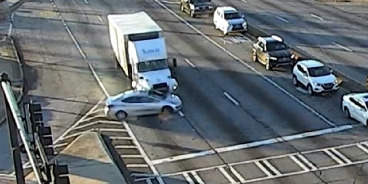 Truck driver pushes car through 2 intersections before driving off ...