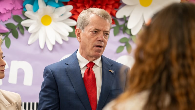 Nebraska Gov. Jim Pilen talks with reporters during a visit with U.S. Education Secretary...