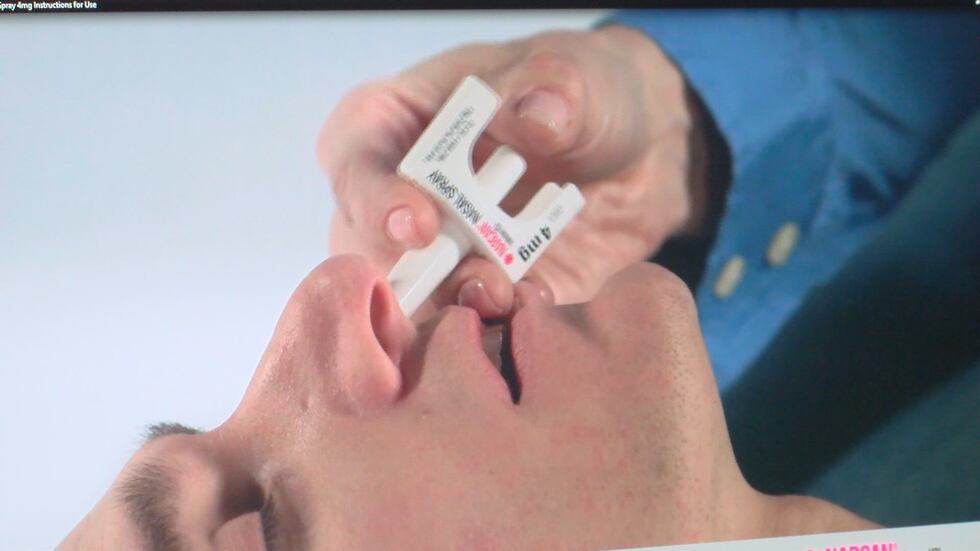 Demonstration of how to use Narcan spray.